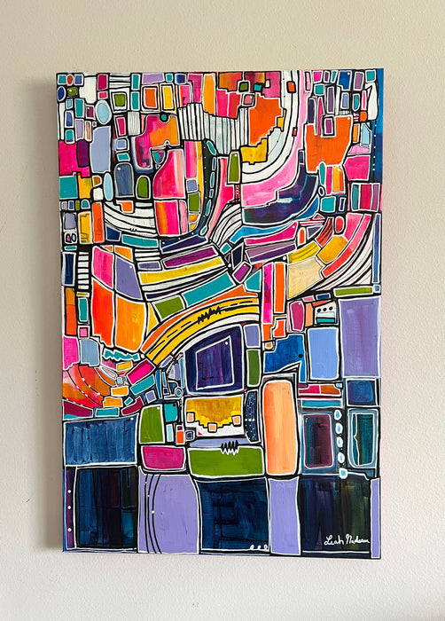 The Future is Feminine by leahnadeau is a colorful abstract acrylic painting showcasing a dynamic arrangement of vibrant squares and rectangles in various sizes. This hand-crafted composition incorporates shades of pink, orange, blue, purple, and green with curving white lines that add a sense of movement.