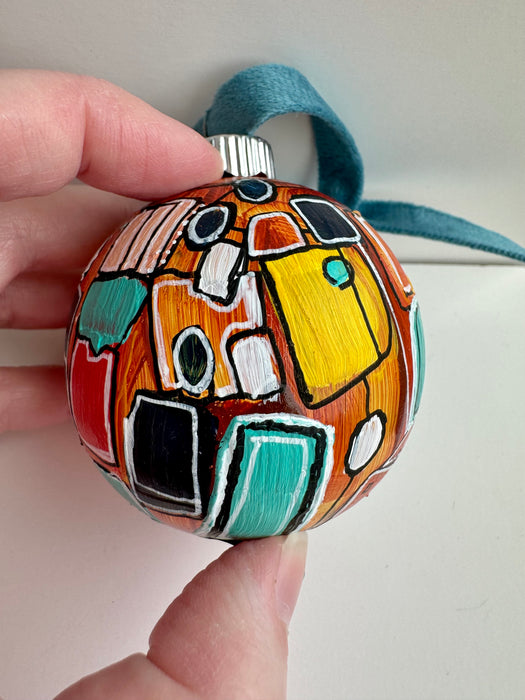 Orange, Yellow and Teal Plastic Ornament