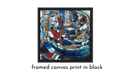 Framed Mid Century Modern abstract canvas print in primary colors with a black frame on a white background