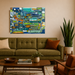 Living room with a green sofa, wooden coffee table, and abstract painting on the wall.