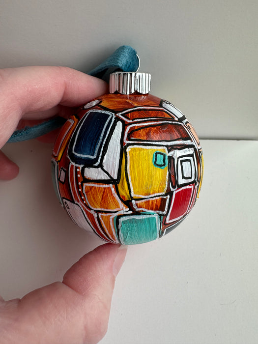 Orange, Yellow and Teal Plastic Ornament